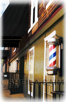 Barbershop poles are the focus of a cityscape