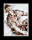 sculture of a man sitting in the snow holding an urn of cigarette butts thumbnail