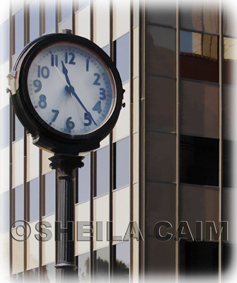 old clock in city street