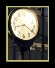 Night shot of old clock in city street thumbnail