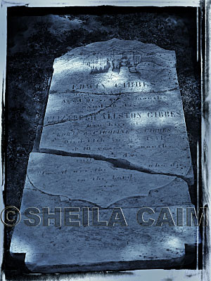 Monocolor image of broken gravestone