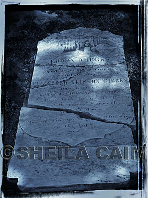 Monocolor image of broken gravestone